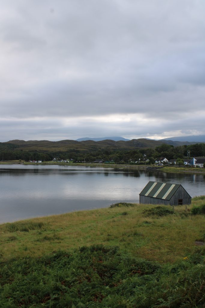 View across Loch Ewe, to the Camping and Caravanning Cub site, at Inverewe Gardens, Poolewe, August 2025.
